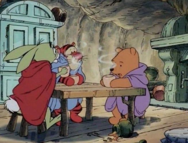 winnie the pooh around a table with friends